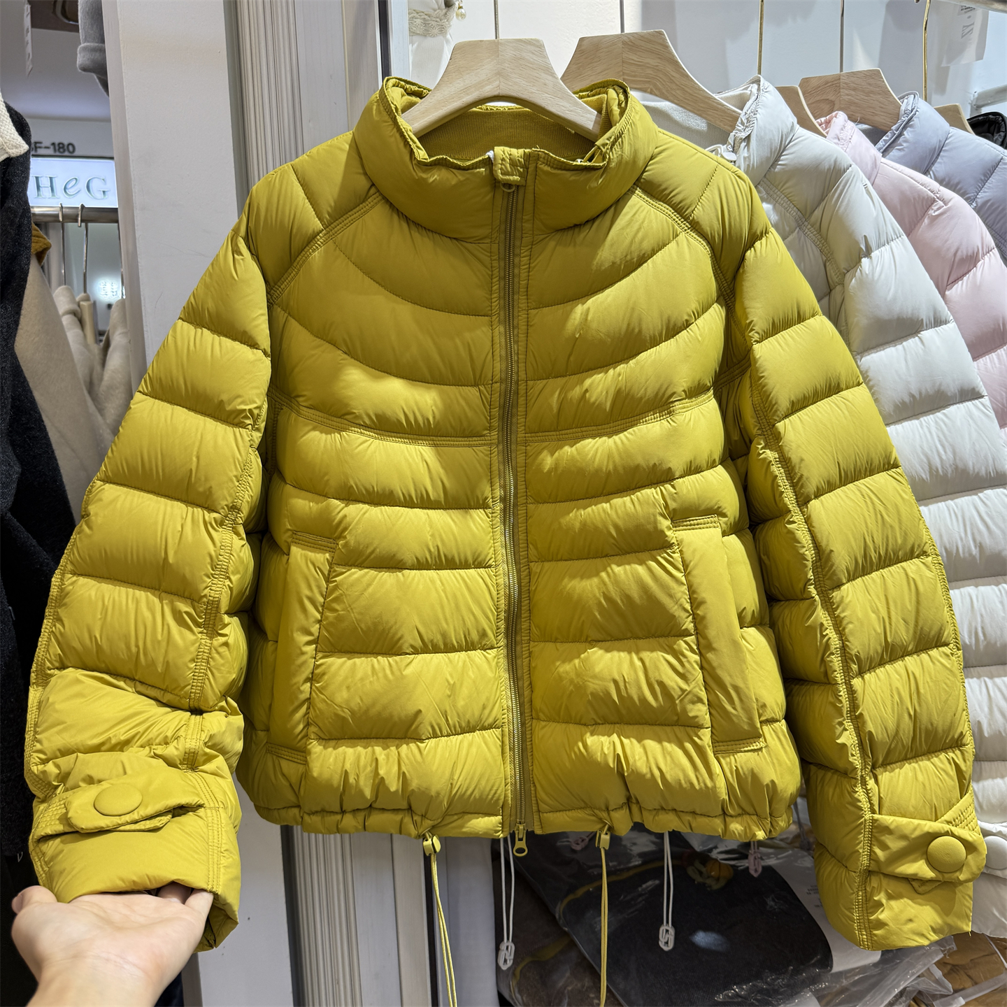 韩系立领排骨羽绒服女冬季2025新款高级感小个子短款白鸭绒外套潮