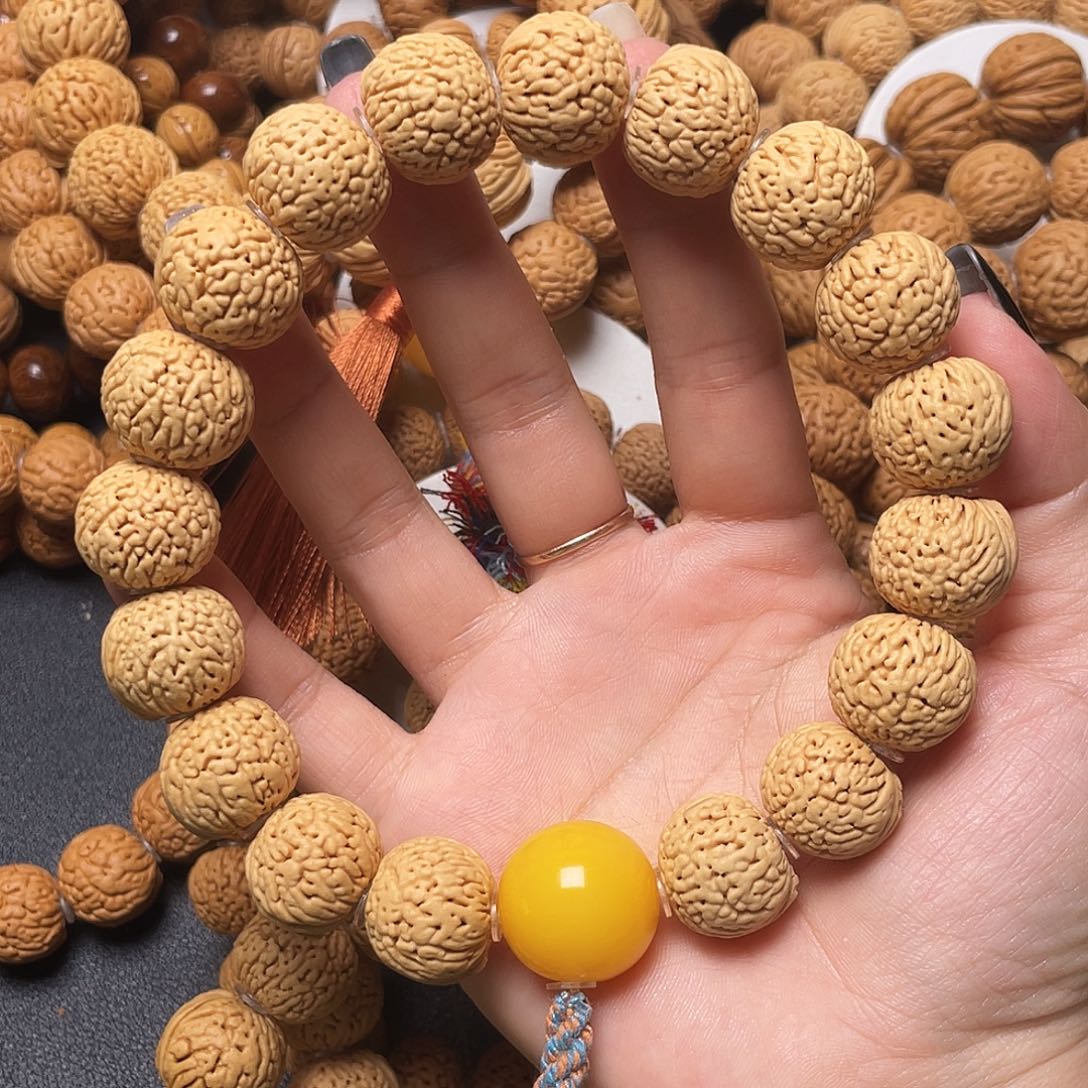 用***…桃核手串龙鳞苹果手持