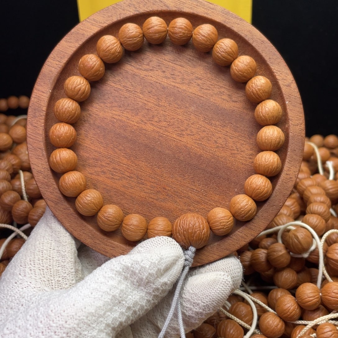 光****猴头核桃手串凤羽