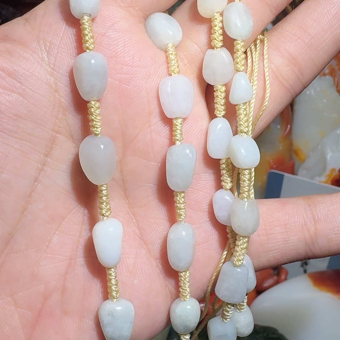 和田玉未镶嵌把件郎**浪