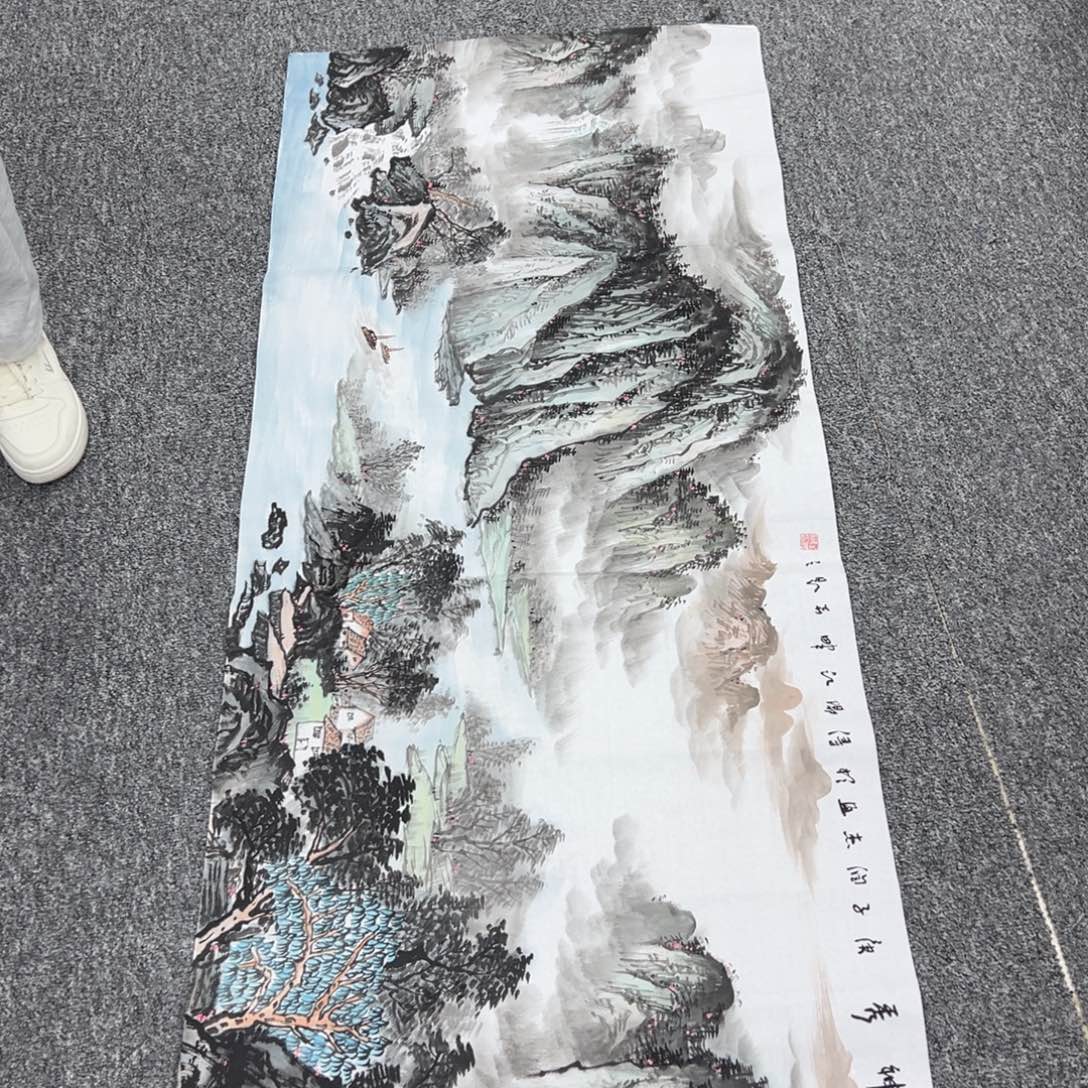 国画卖字画的小男孩