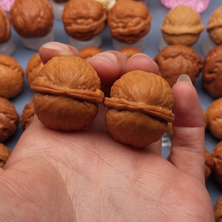 文玩核桃把件金佛