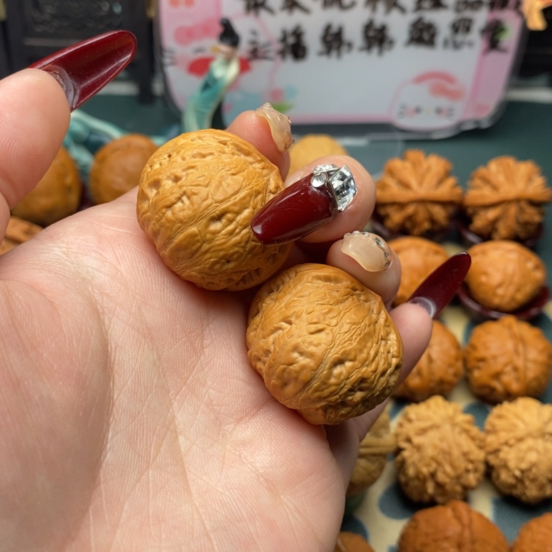 文玩核桃把件胖头元宝