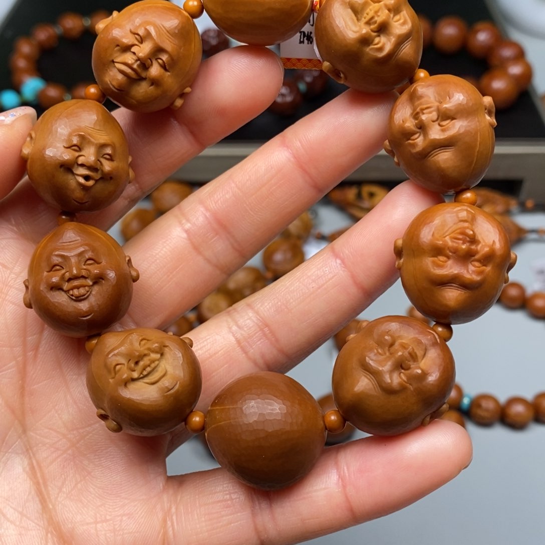 橄榄核吊坠笑佛手串