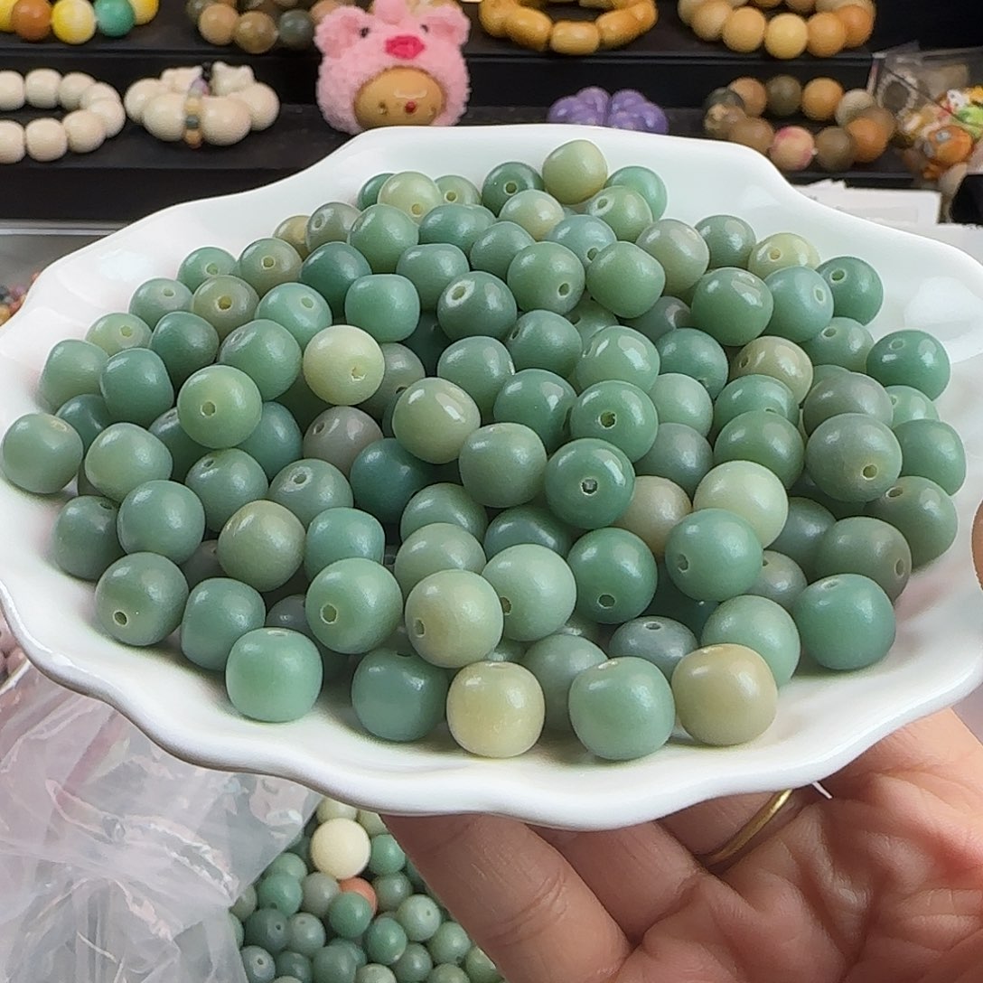 菩提根/象牙果手串微瑕卡10青提奶绿桶200颗