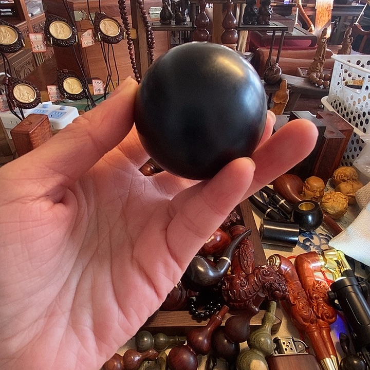 悠***然花梨木类紫光檀手球5.0