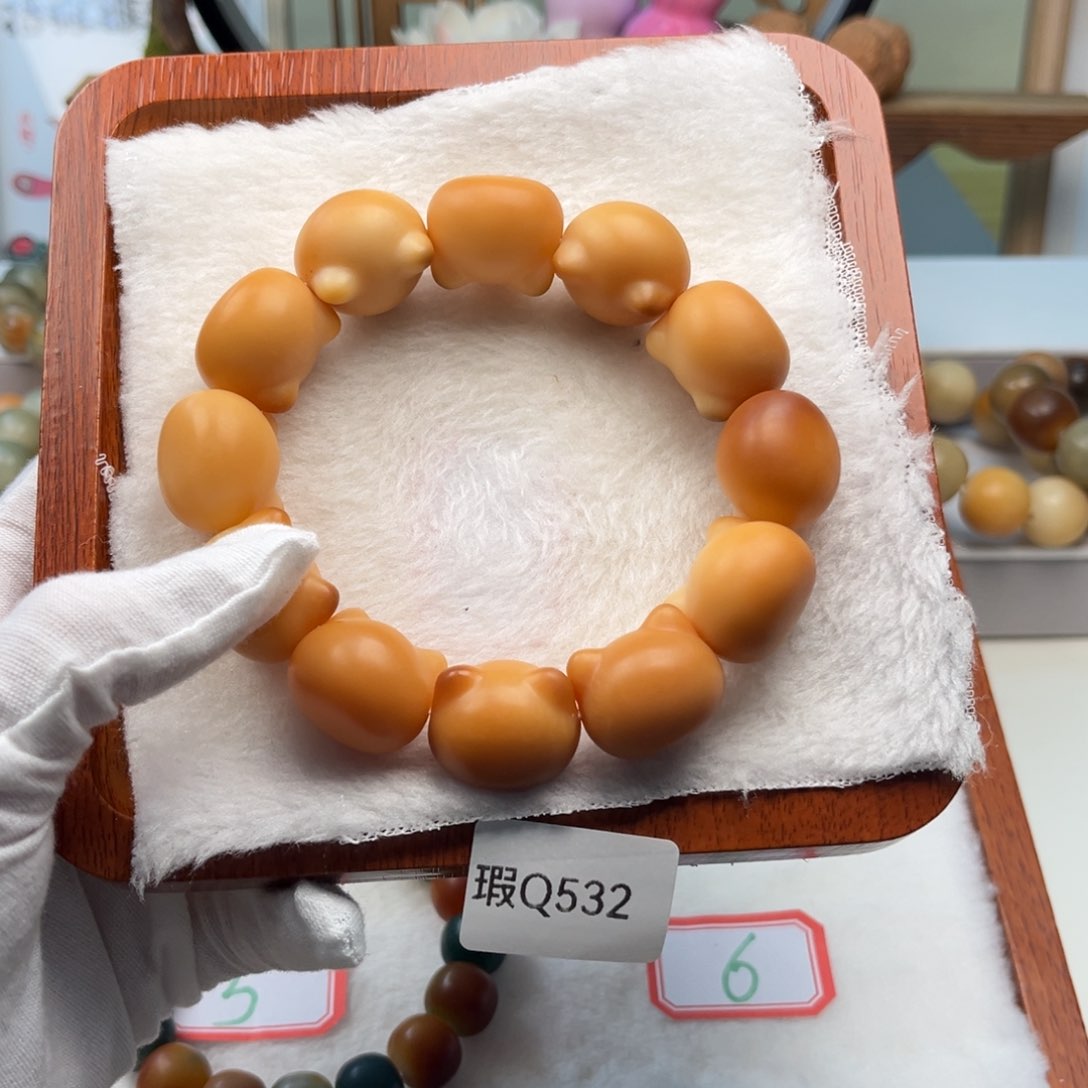 菩提根/象牙果手串天****120mm猫头一串瑕Q532