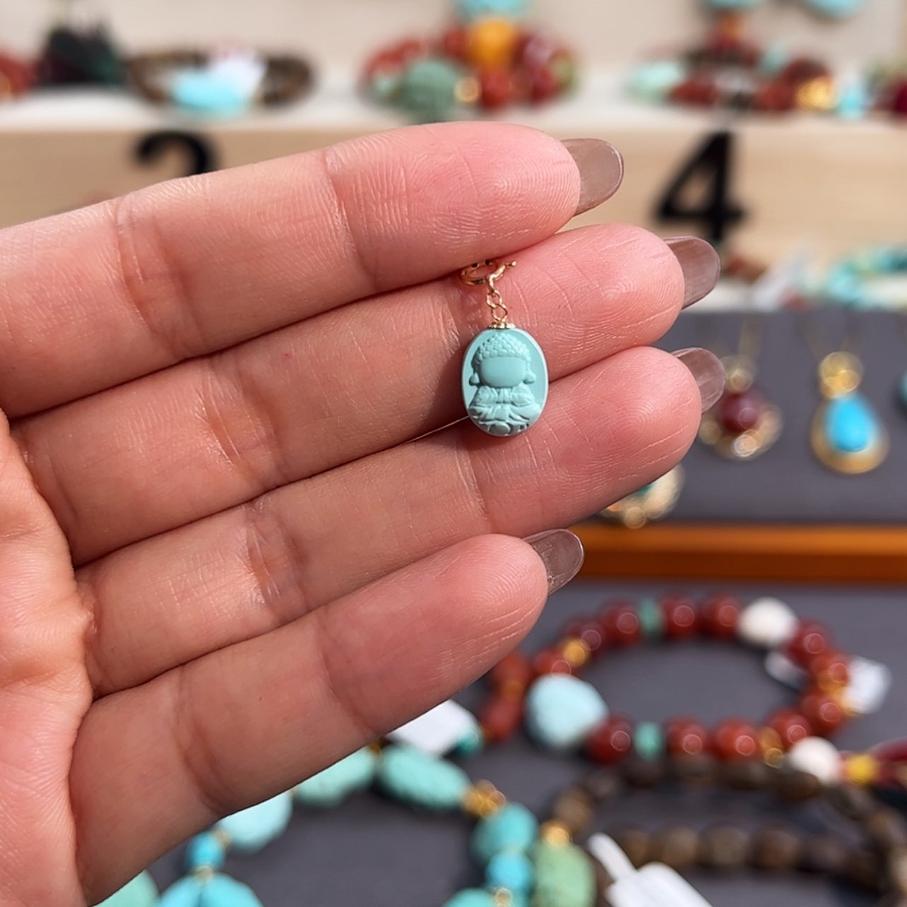 【闪购商品】18K金镶嵌绿松石宝宝佛滴流