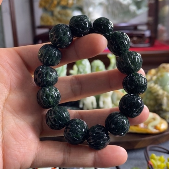 蛇纹石玉手链未镶嵌来*球