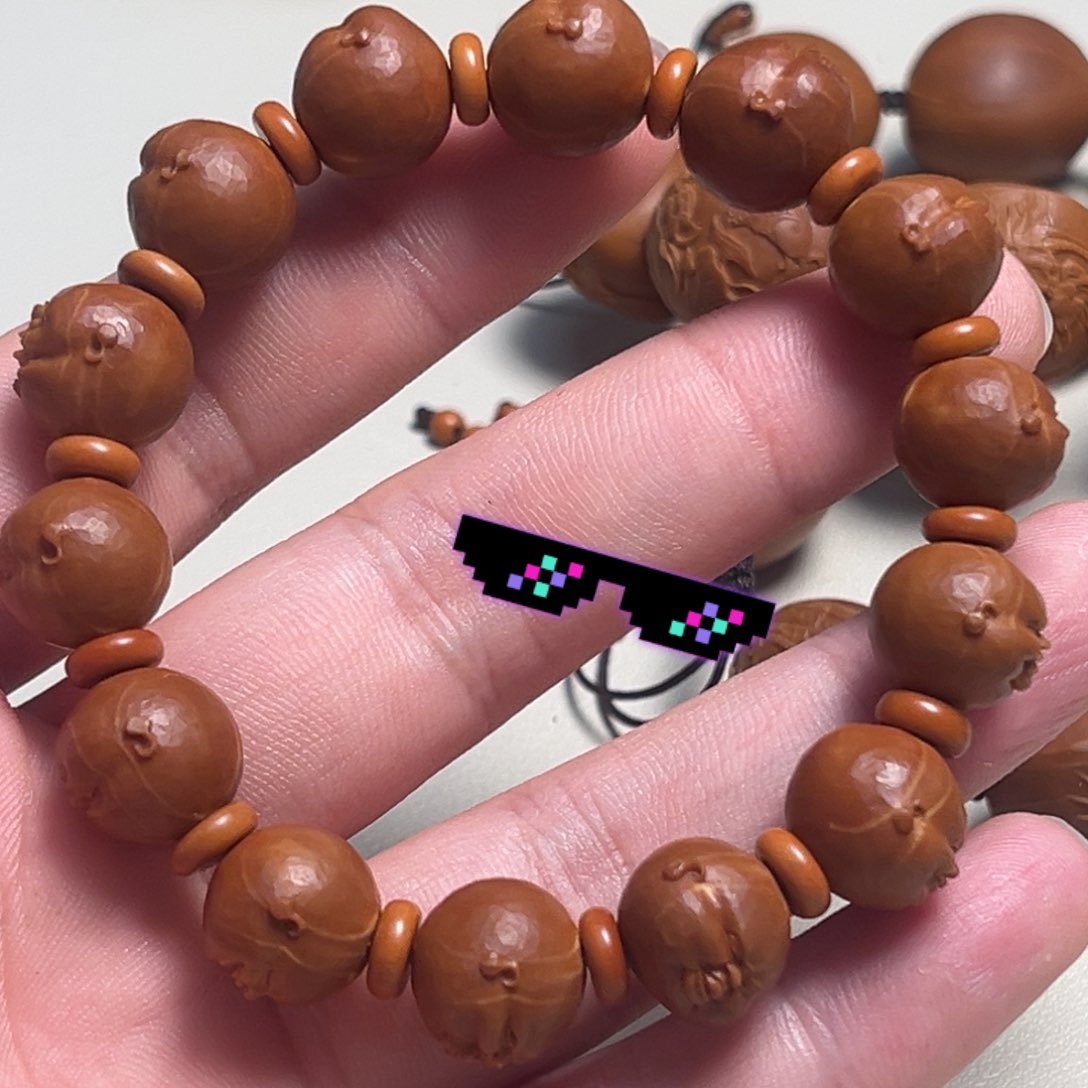 橄榄核吊坠M****e人生百态