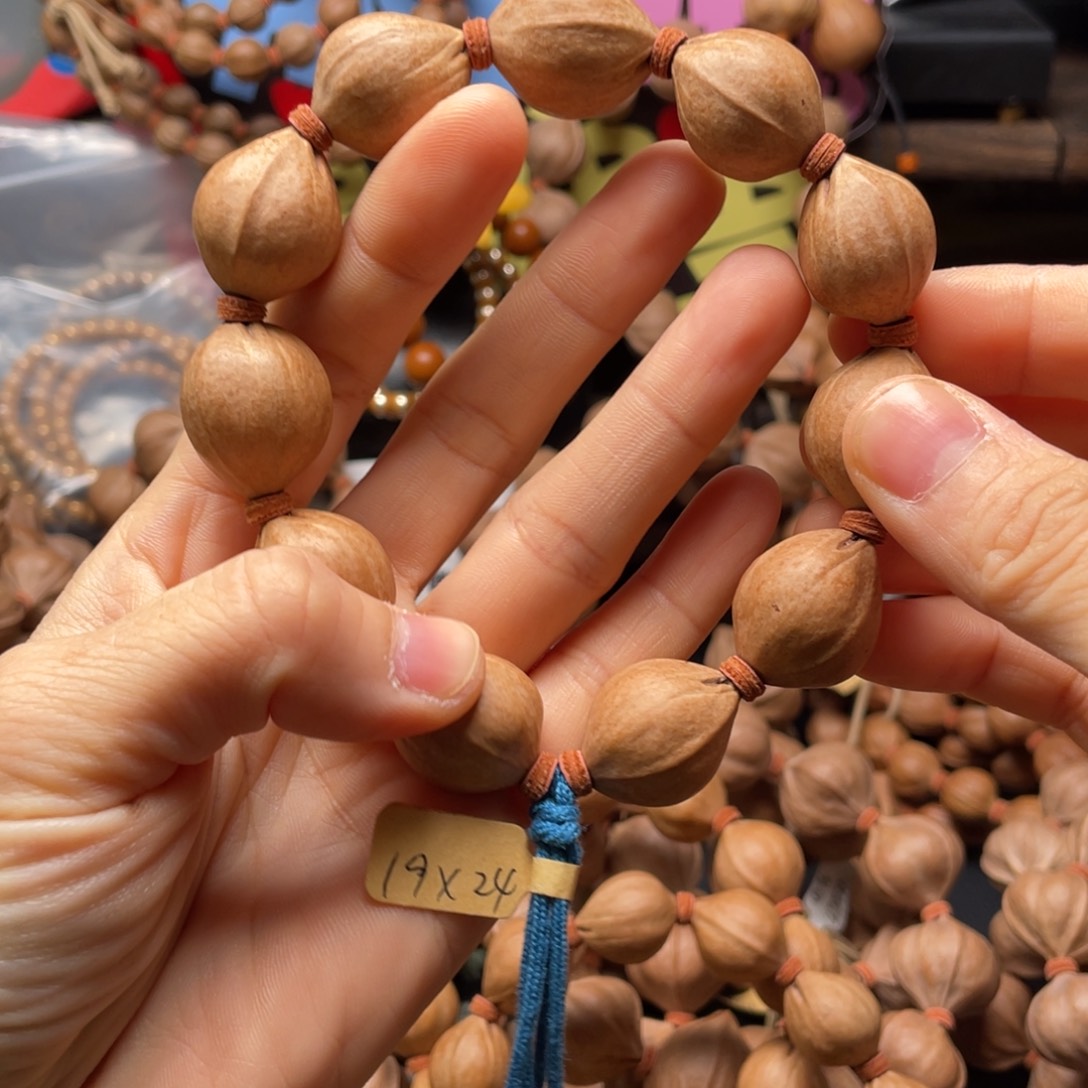 百***哥吊坠橄榄核1924老料