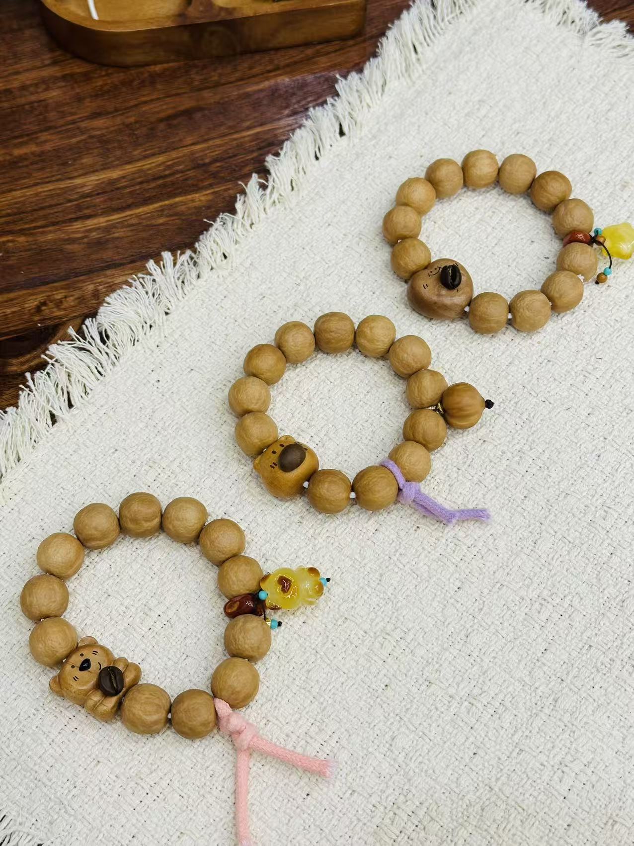 A10-猴头原皮砂糖橘可爱卡通手串