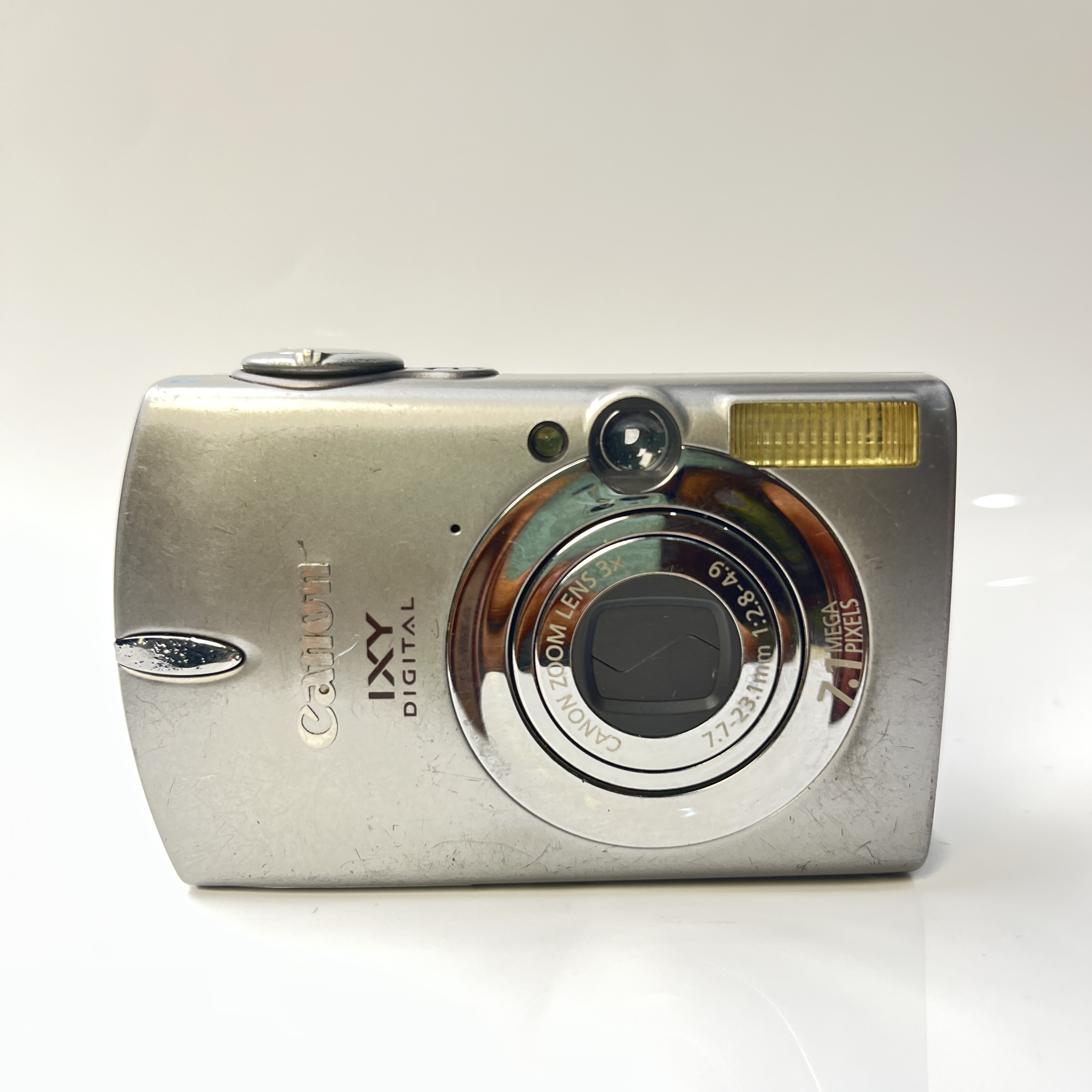 95新 Canon/佳能 ixy600（700）银710万像素3倍变焦数码相机