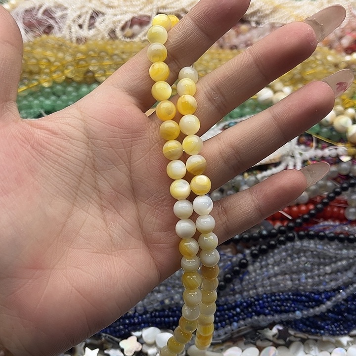 玛瑙/玉髓珠宝半成品未镶嵌一条6mm左右黄蝶贝