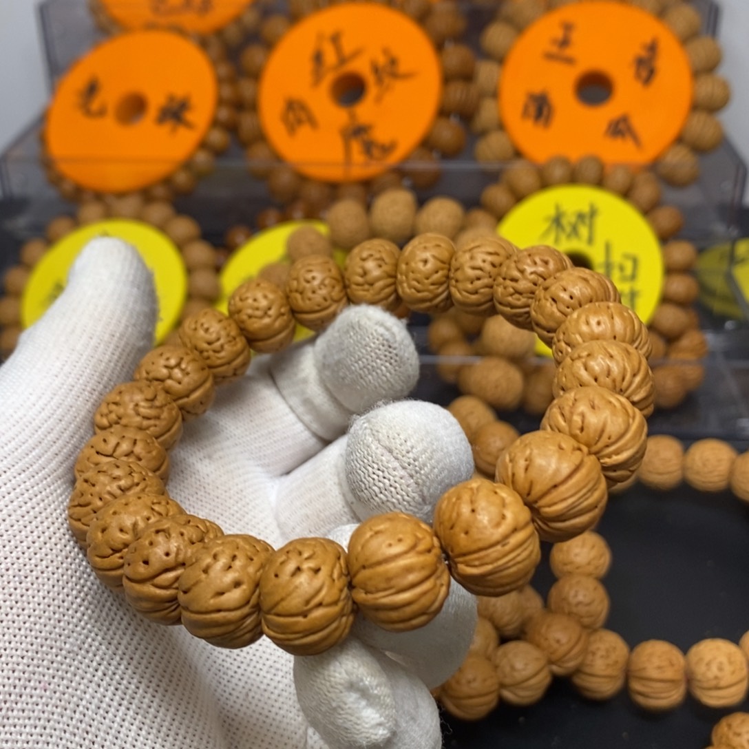 阿***西手串桃核树王纽扣桃核手串