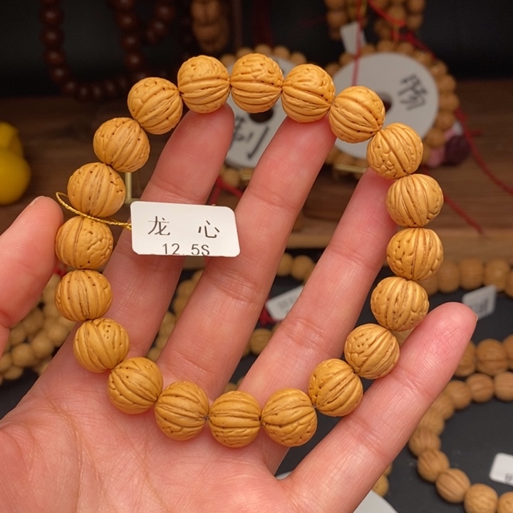桃核手串沉**씨龙心12.5S误差0.5之间