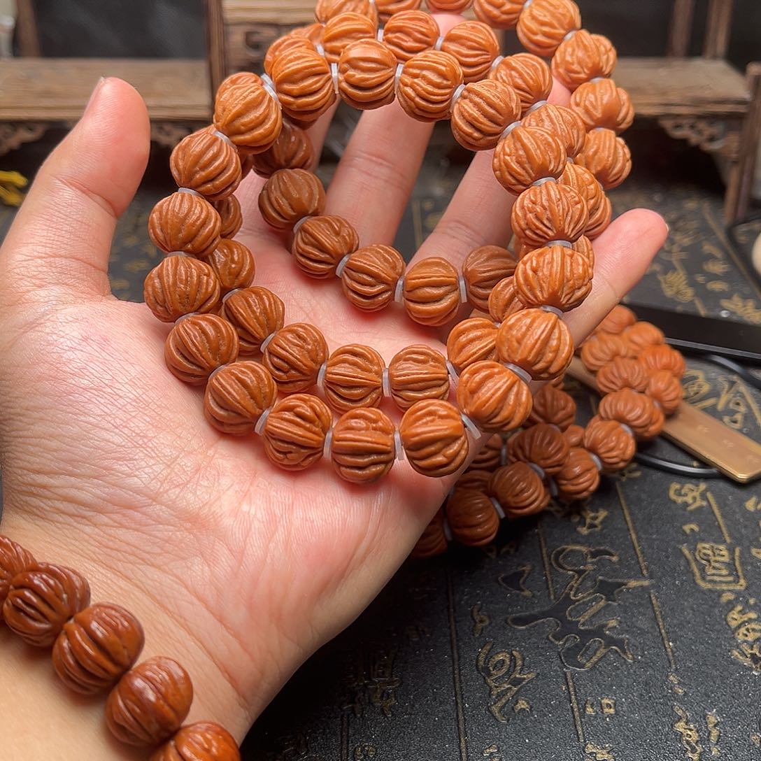 吊坠桃核佛手手串