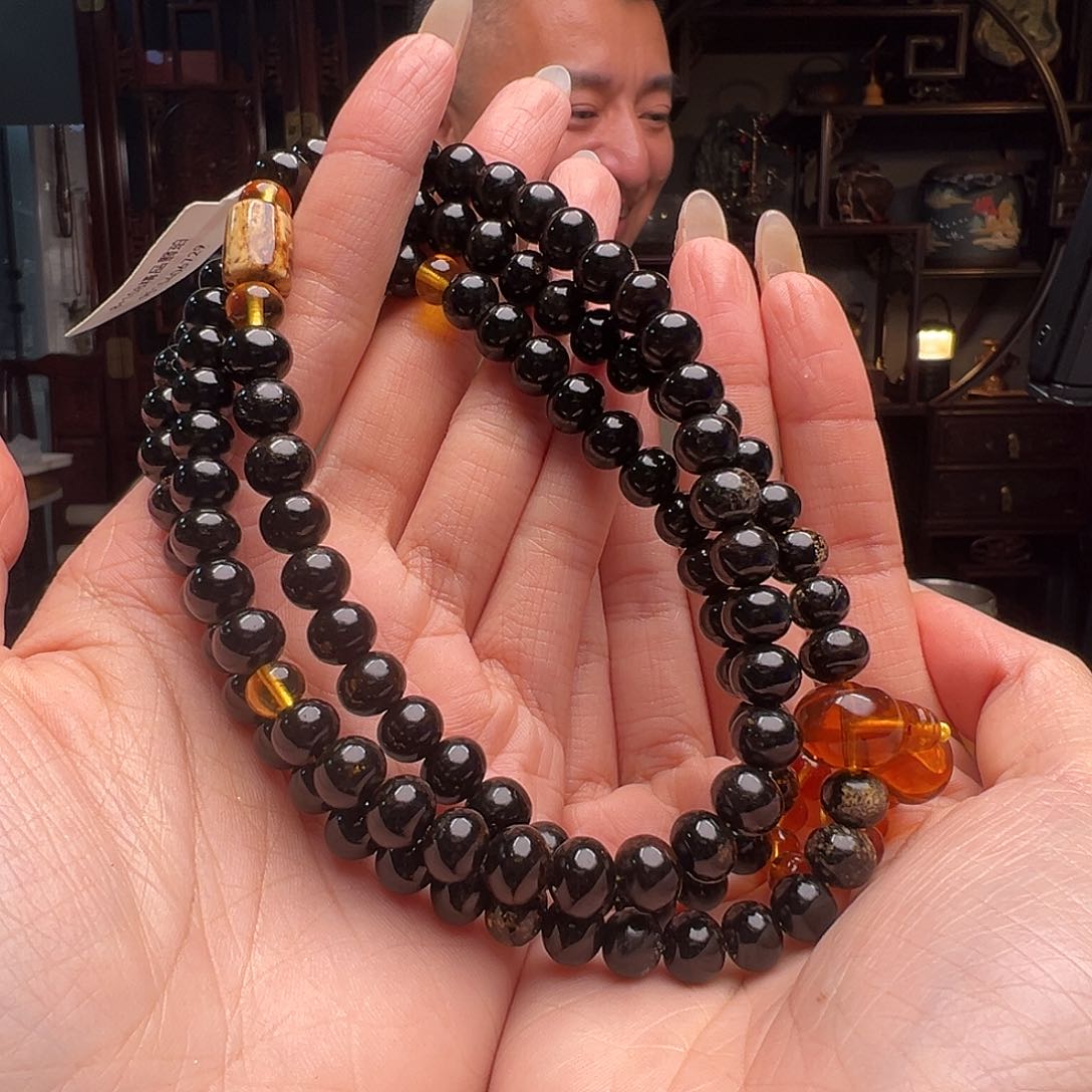 琥珀裸石未镶嵌战*抚顺琥珀66015。8mm