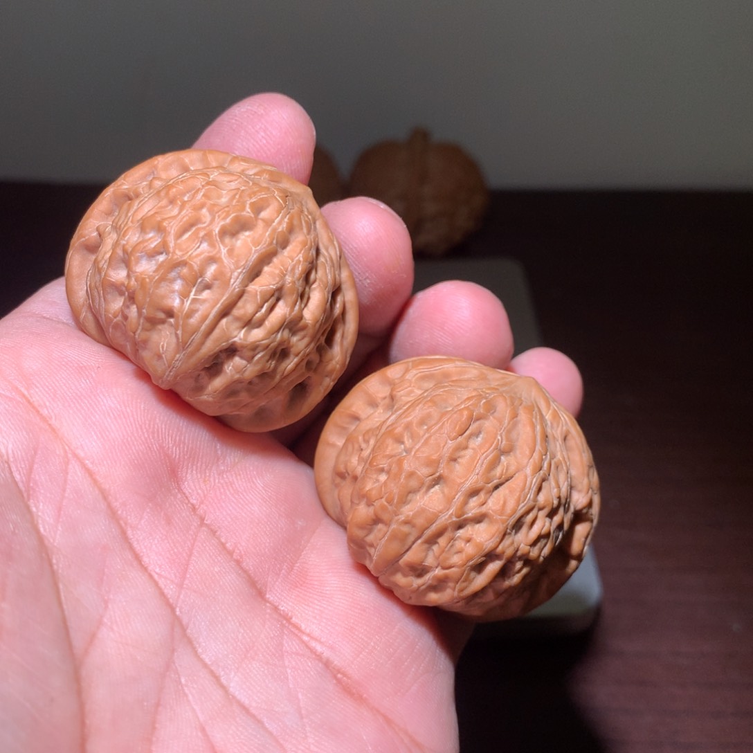 文玩核桃把件铁锤40寿桃