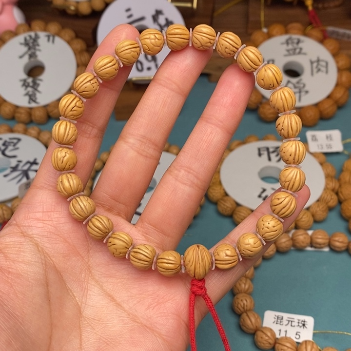 桃核手串三道筋9尺寸误差0.5之间抛光