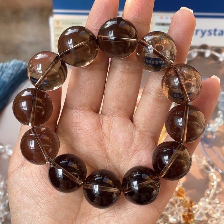 水晶手串未镶嵌张***?茶晶有棉絮
