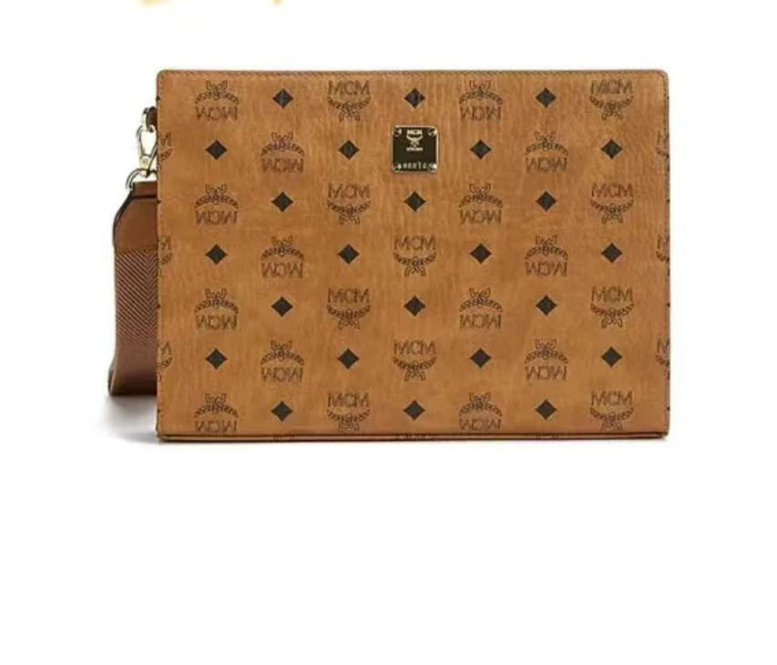95新 MCM mcm纯干邑色洗漱手拿包