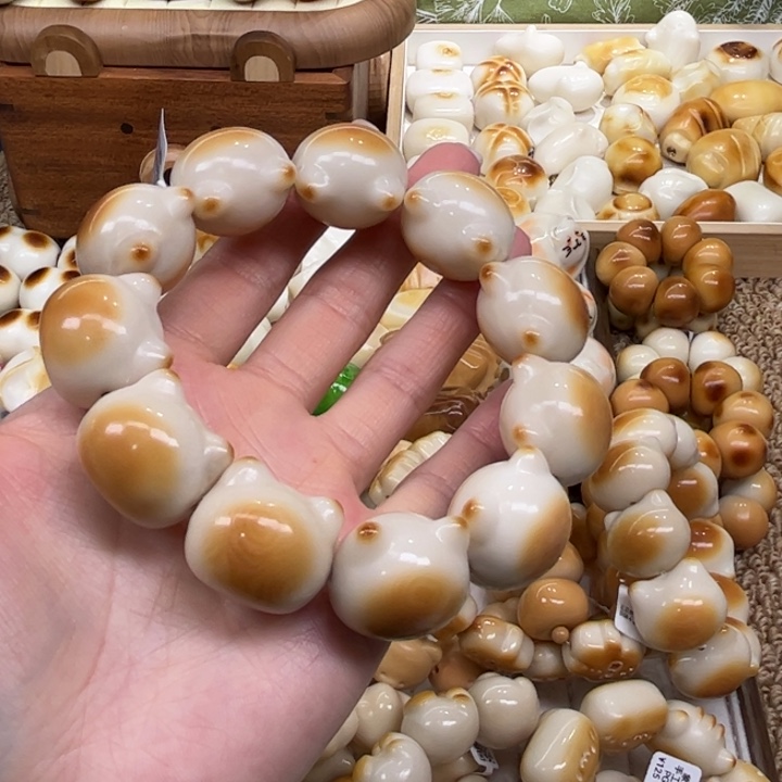 把件菩提根/象牙果12.14.22象牙果炭烤猫头瑕