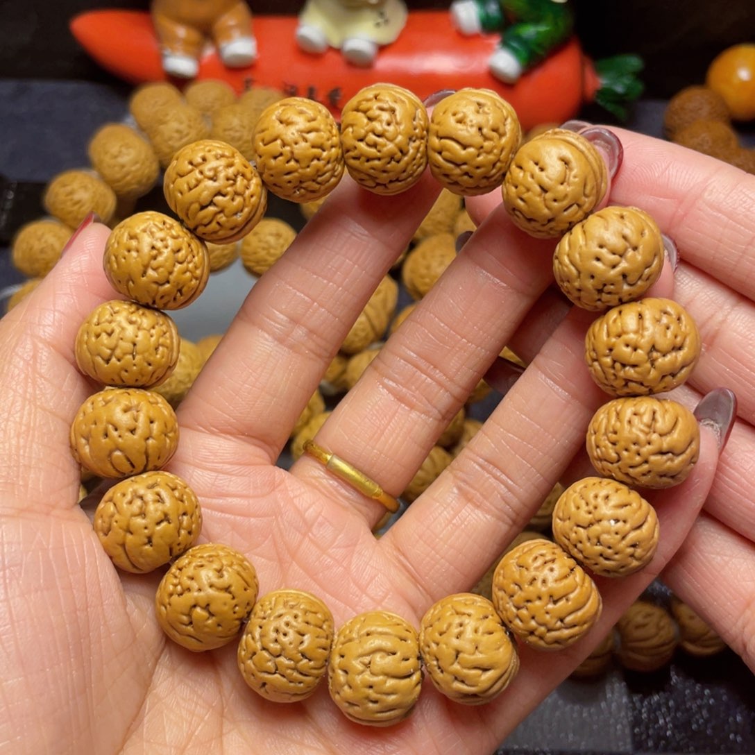 桃核手串m***，16金豆手串