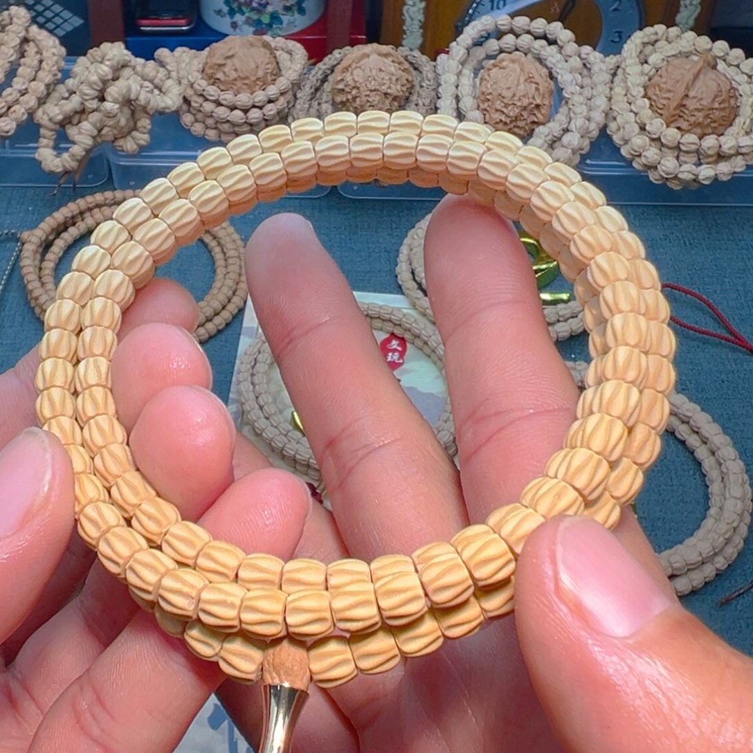 薛***保柏香籽/百香籽吊坠