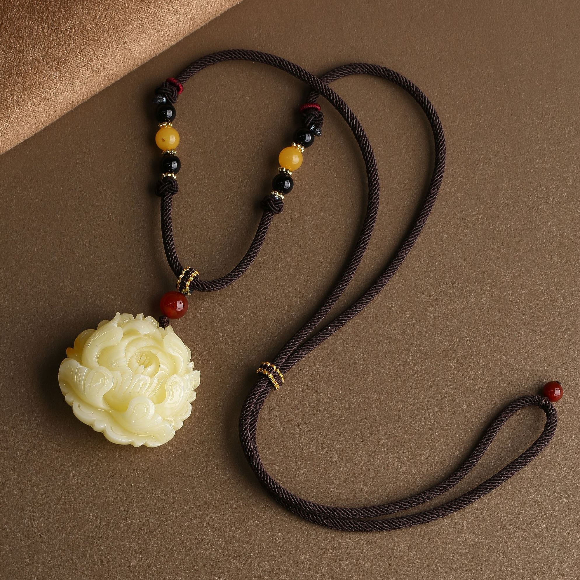 POTALA PALACE/布达拉宫蜜蜡吊坠牡丹花雕刻款