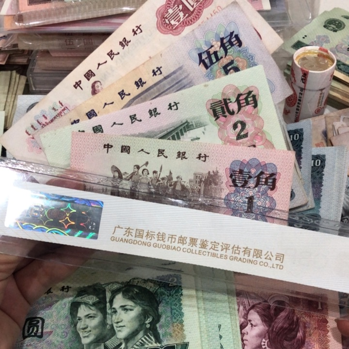 女拖一二五角各一张，旧品