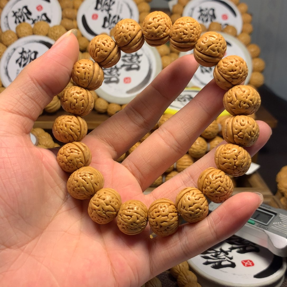鬼*愁精品桃核金鱼肚手串