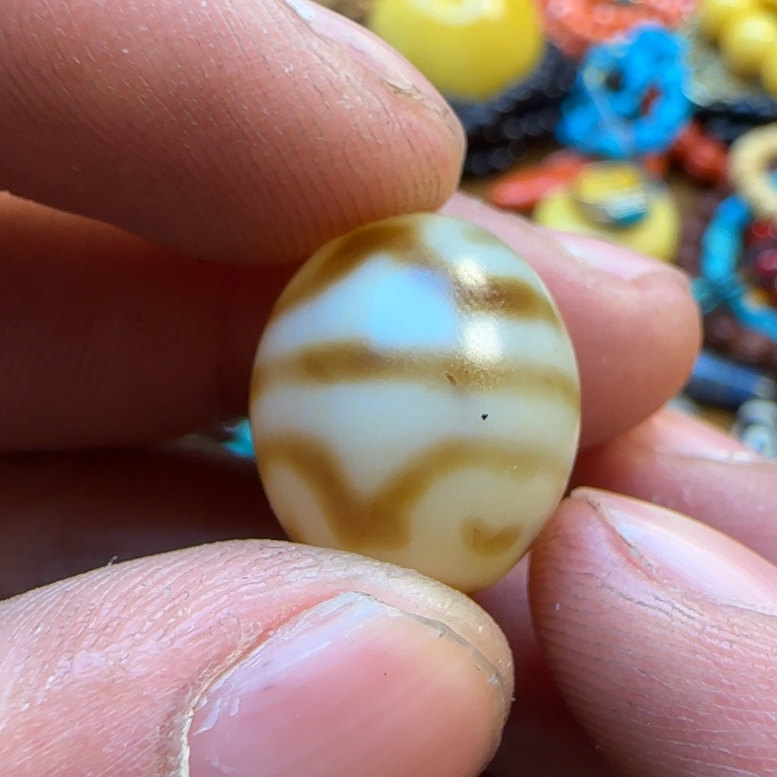 桃核吊坠拉萨市的拉萨保真