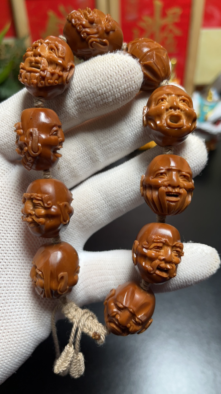 须派十八罗汉橄榄核雕刻手串