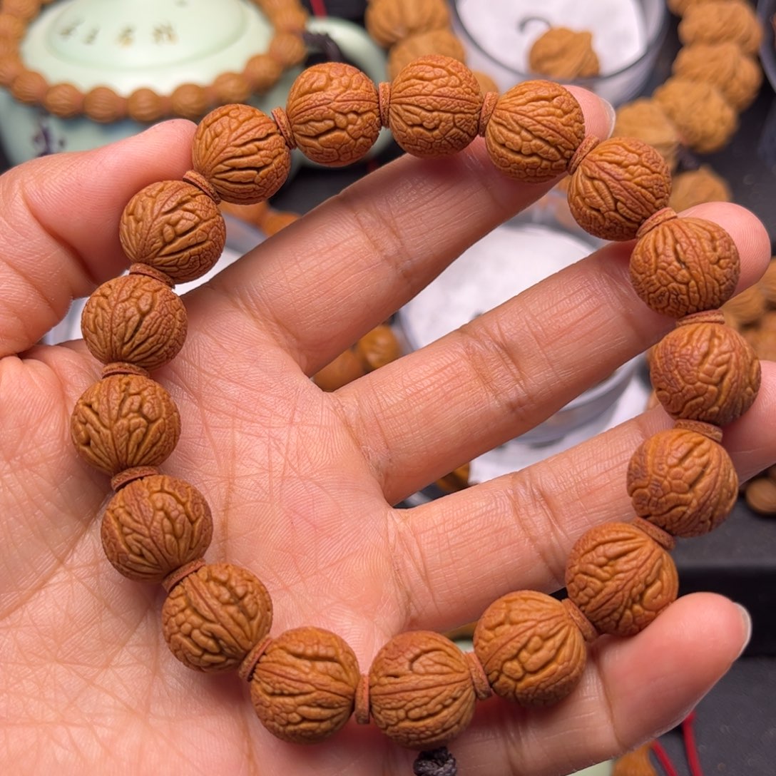 熙***子桃核吊坠龙纹桃核