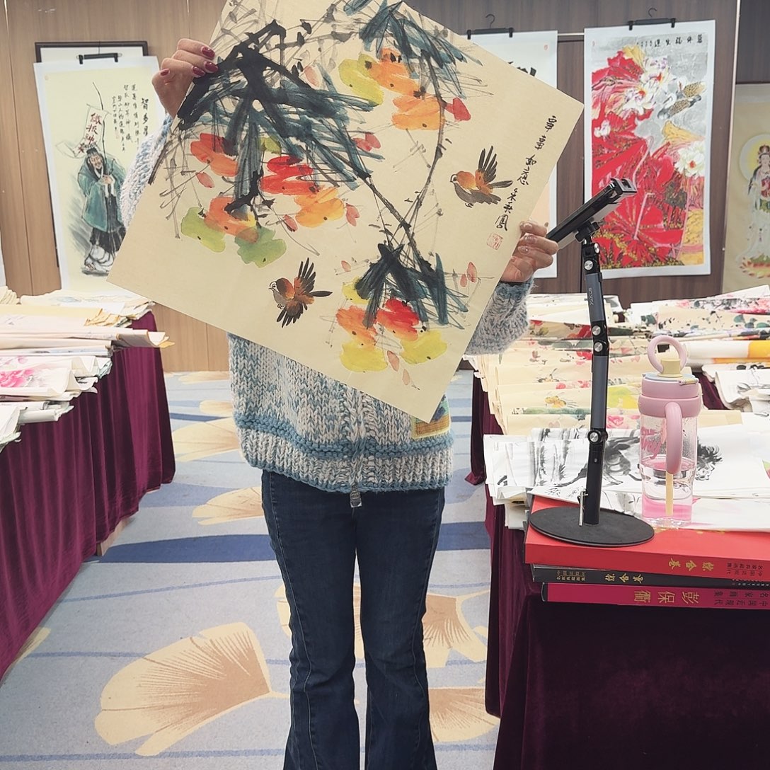 国画长腿美女卖画