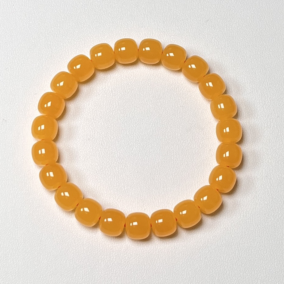 10*9焦皮超红同料蜜蜡手串