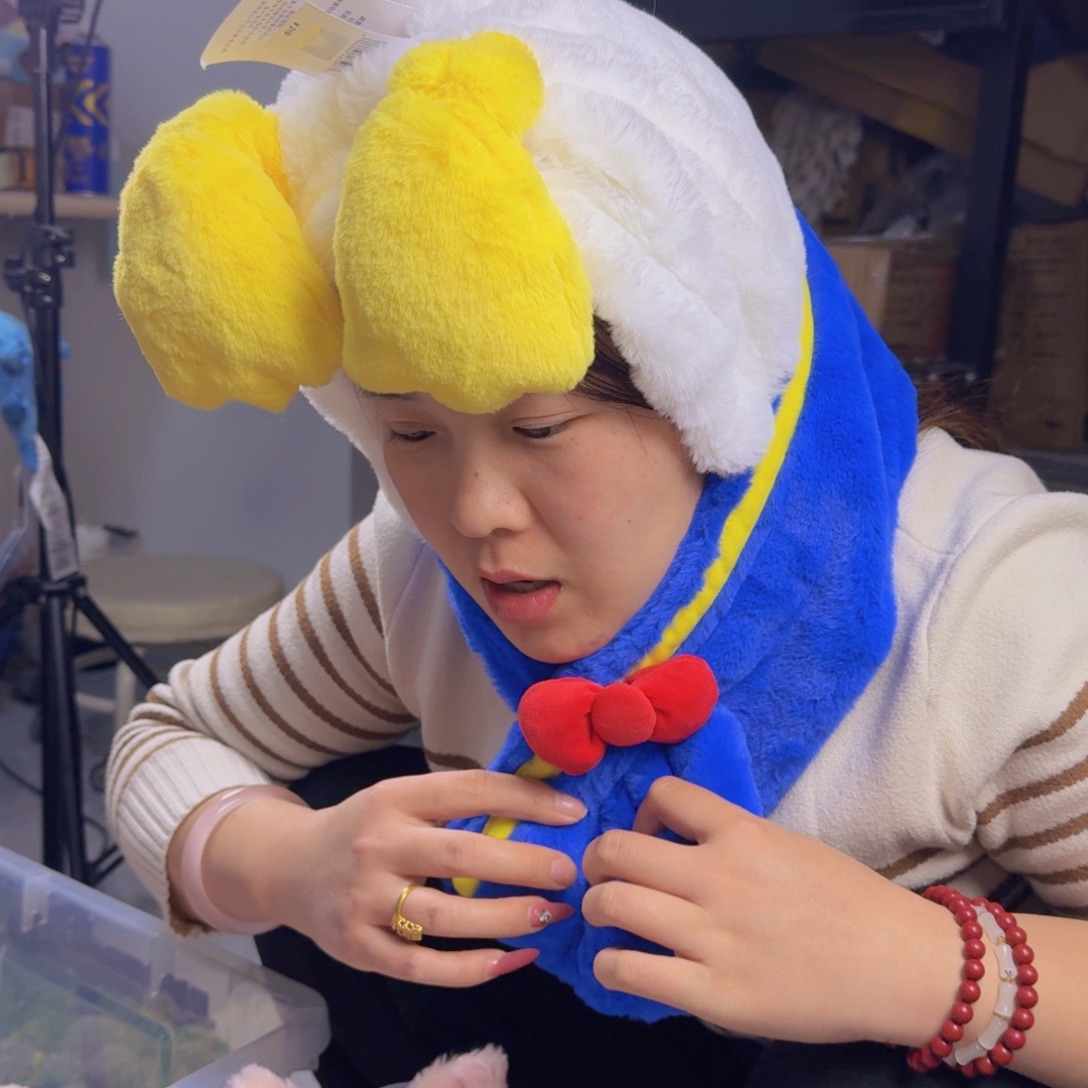 鸭鸭可动帽子牌齐