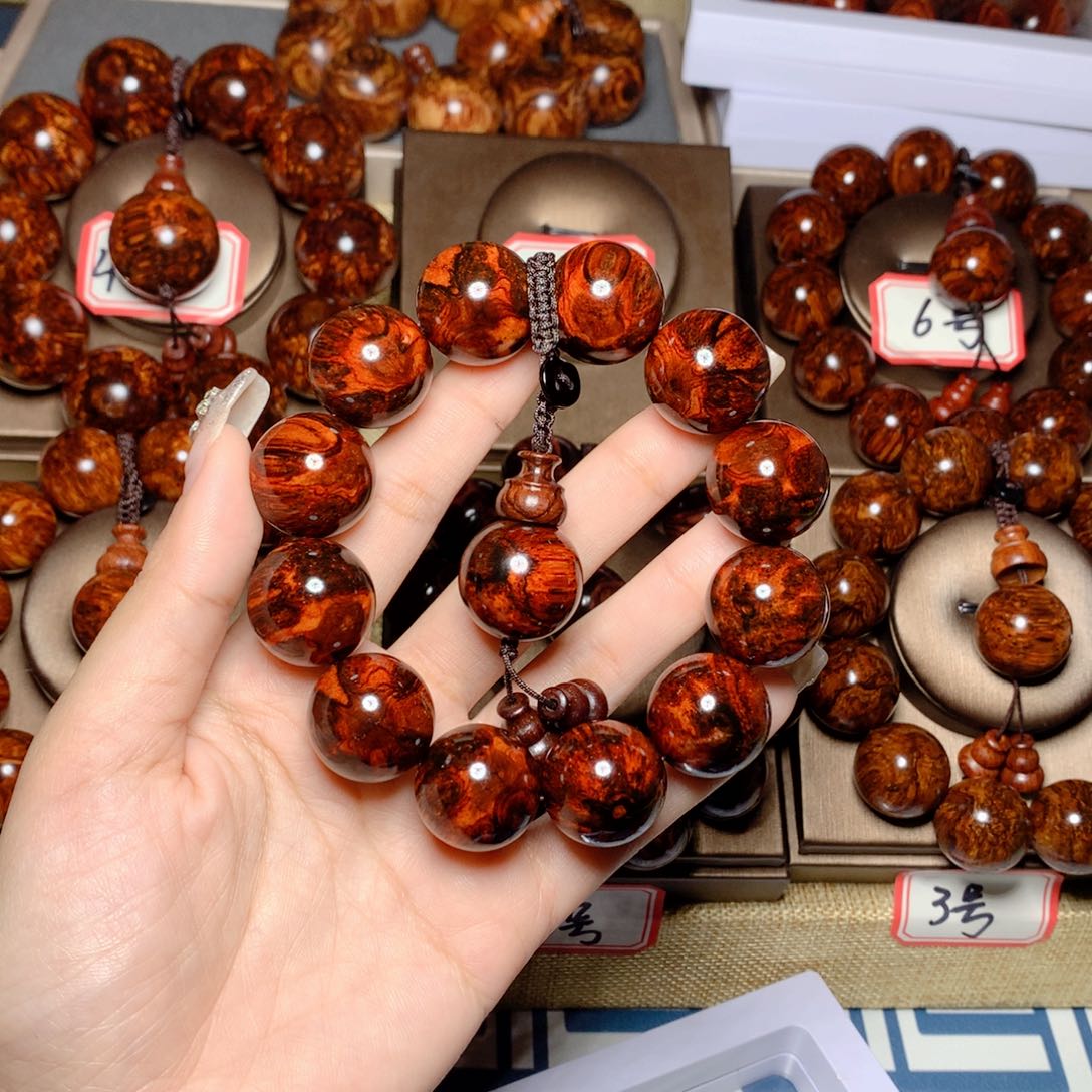 花梨木类手串/手链与**行