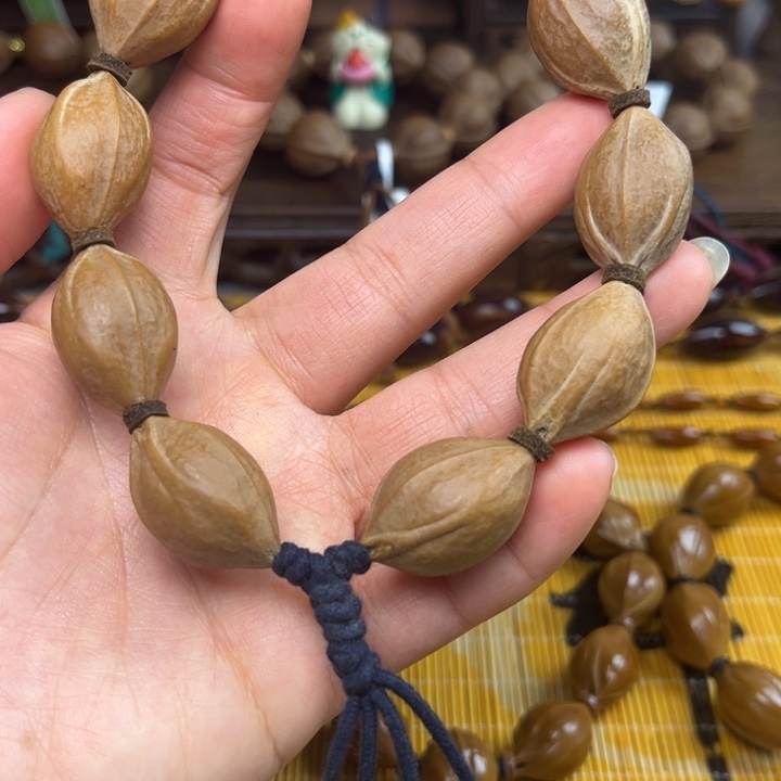 橄榄核手串/手链施****子梅林铁核1.9*2.8