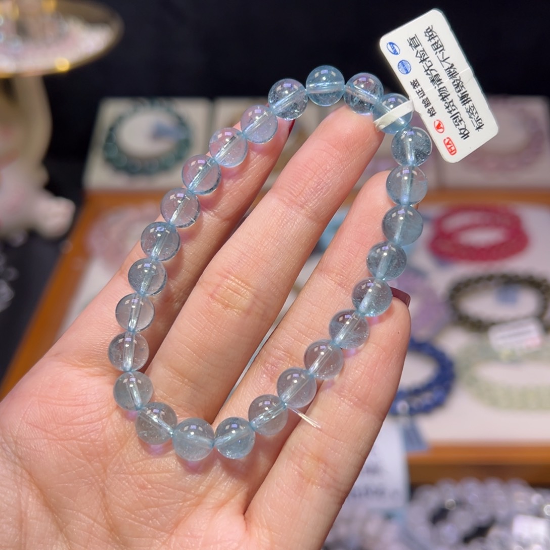 托帕石手串未镶嵌知**丁7m毕业级高透蓝托帕