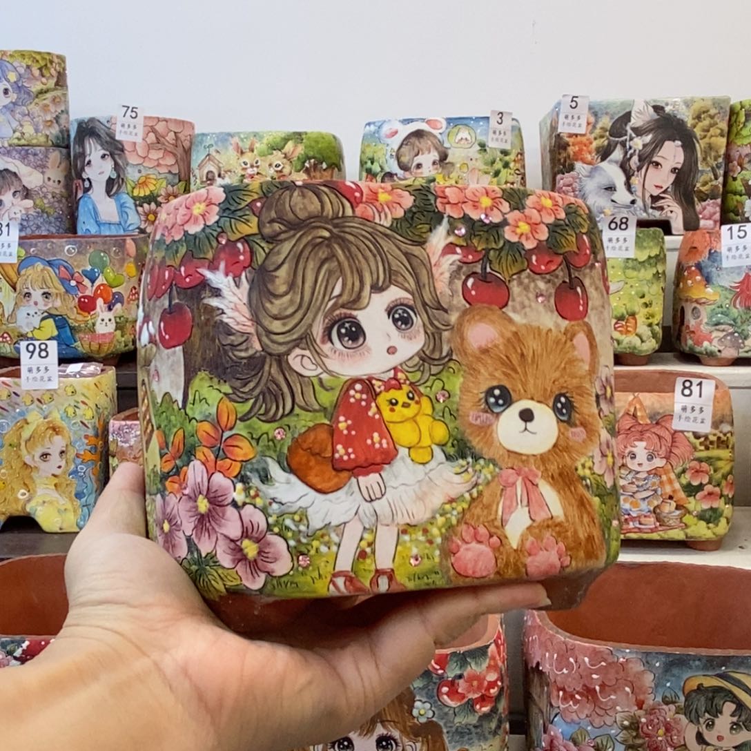 土***片萌多多手绘花盆的设计