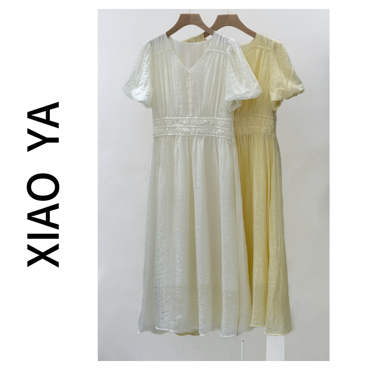 25665夏季新款气质V领透明扣腰部设计感中长款连衣裙（裙长110）