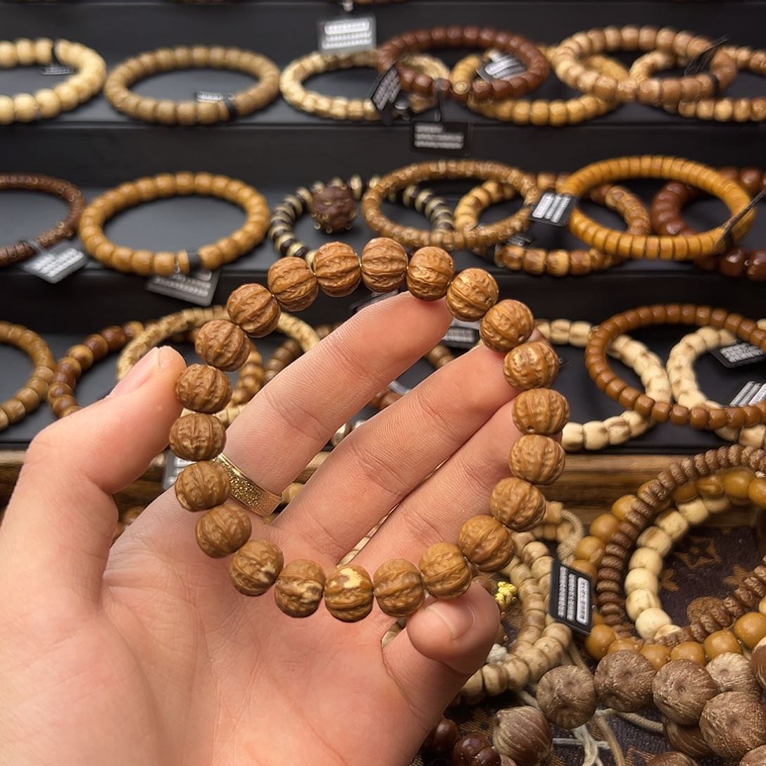 紫金鼠手串黄金甲实心八凌花皮1011