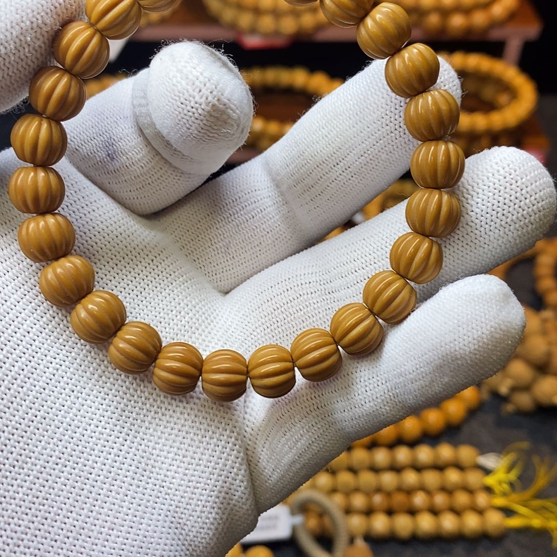 文玩核桃吊坠瓜珠