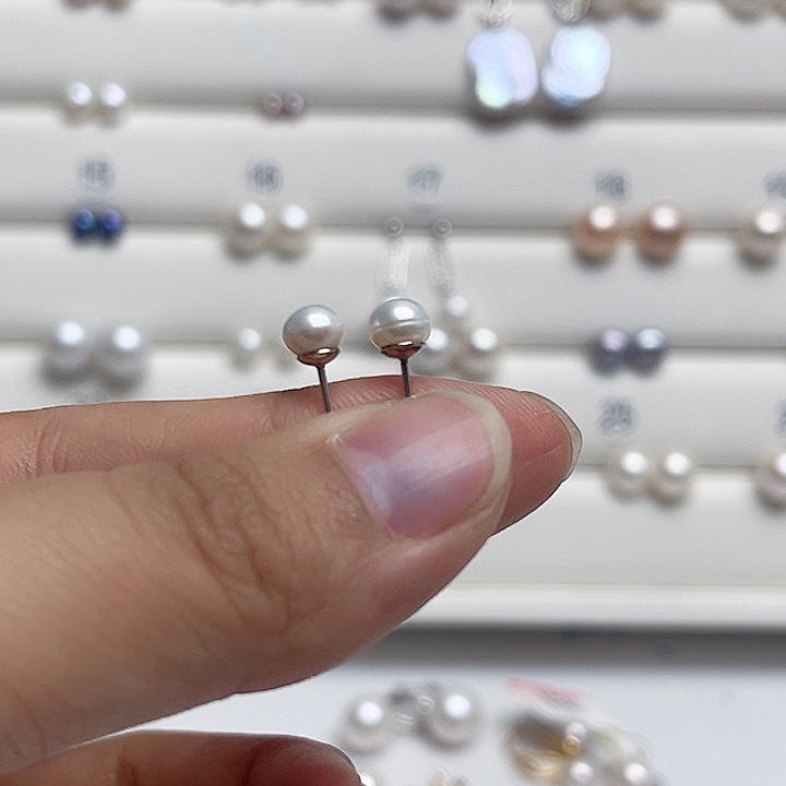 钻****淡水珍珠银S925镶嵌耳饰