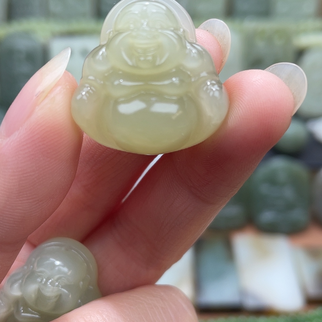 用***儿和田玉未镶嵌吊坠(不含链)