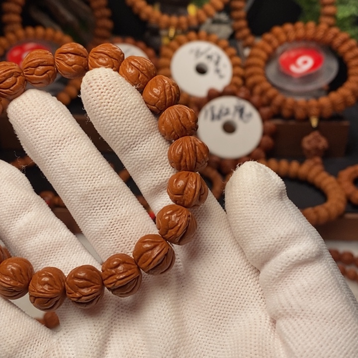 桃核手串d****r秦岭龙纹