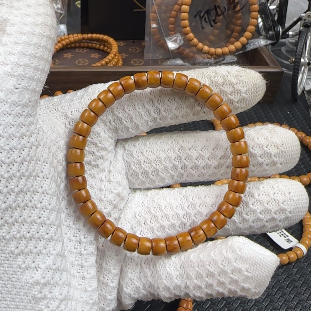 橄榄核吊坠7.0mm紫金鼠纯肉直切单圈