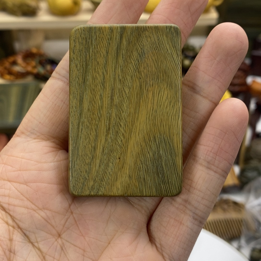 n***a木绿檀木料手把件